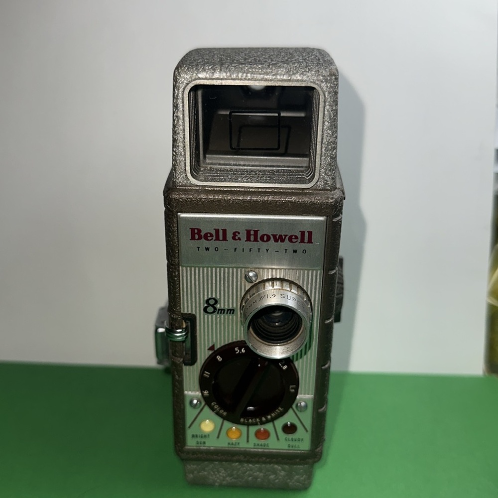 Vintage 8mm Camera - Silver, Bell & Howell Model 252 8mm Movie Camera, 1950’s.